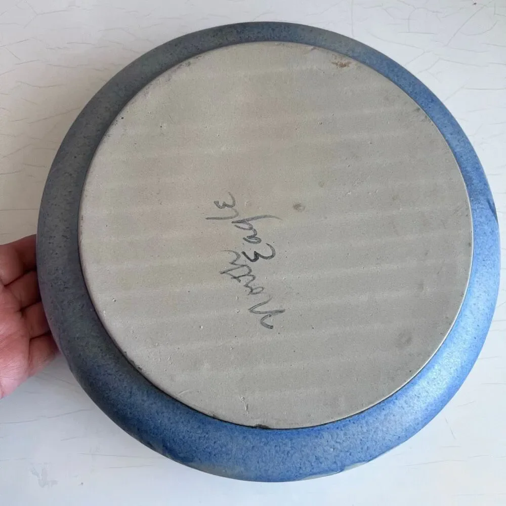 North Eagle Pottery hand-thrown and features a matte or glazed finish in blue an